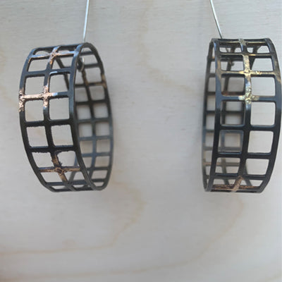 Steel wheel sculptural earrings